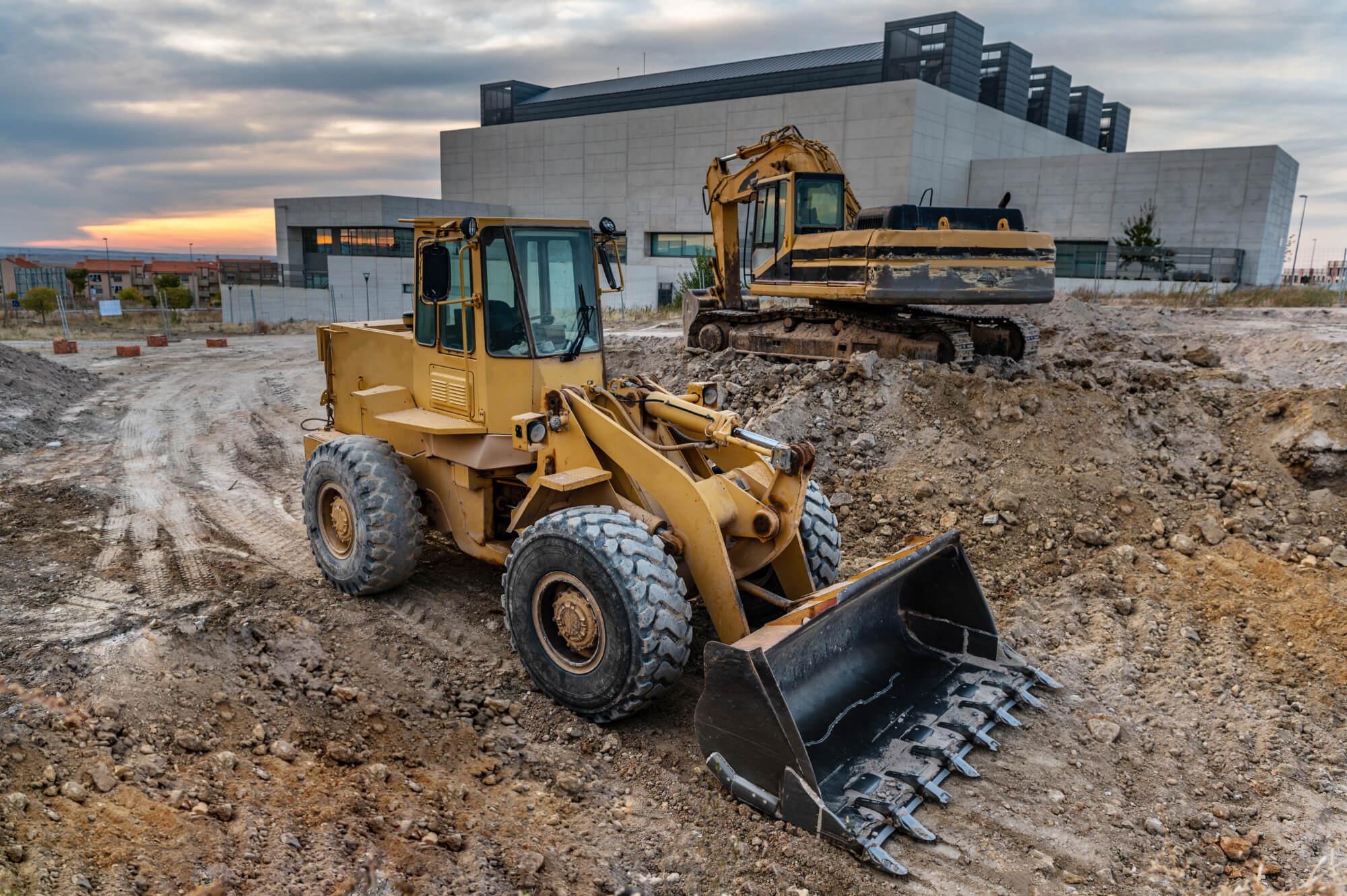 Two excavators at a construction site